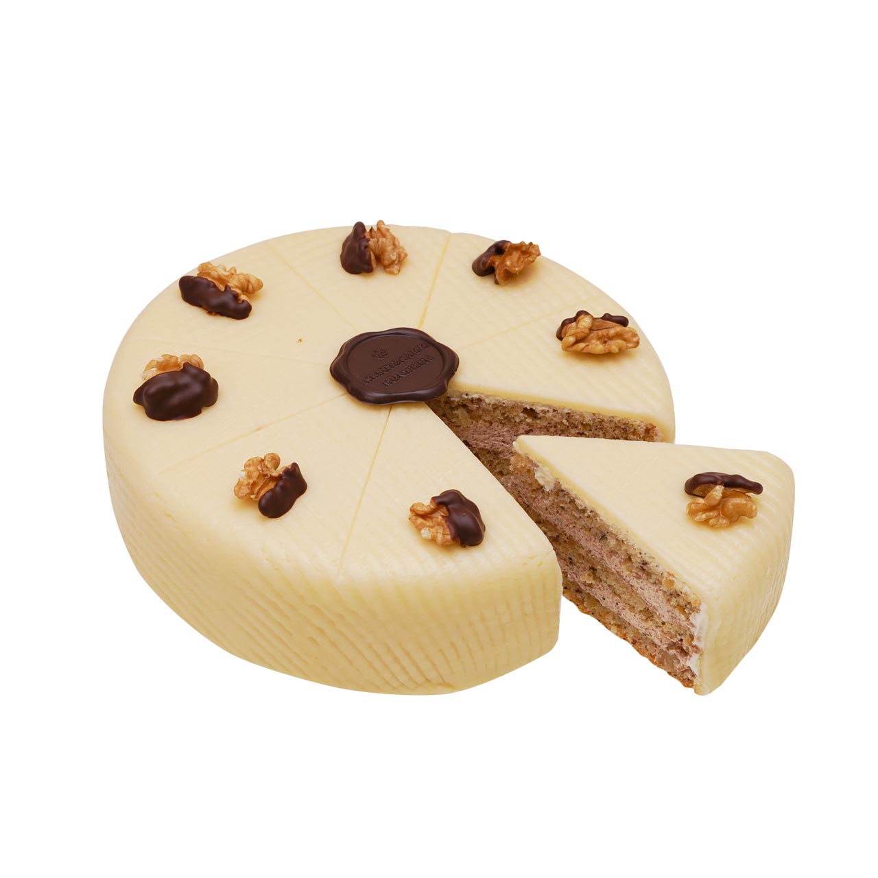 Walnuss-Torte-klein-St-ck-im-Schnitt Eine runde Torte, aufgeschnitten, mit weisser Glasur, Walnuessen und Schokoladendekor. Text: Backhaus Kreutzkamm.