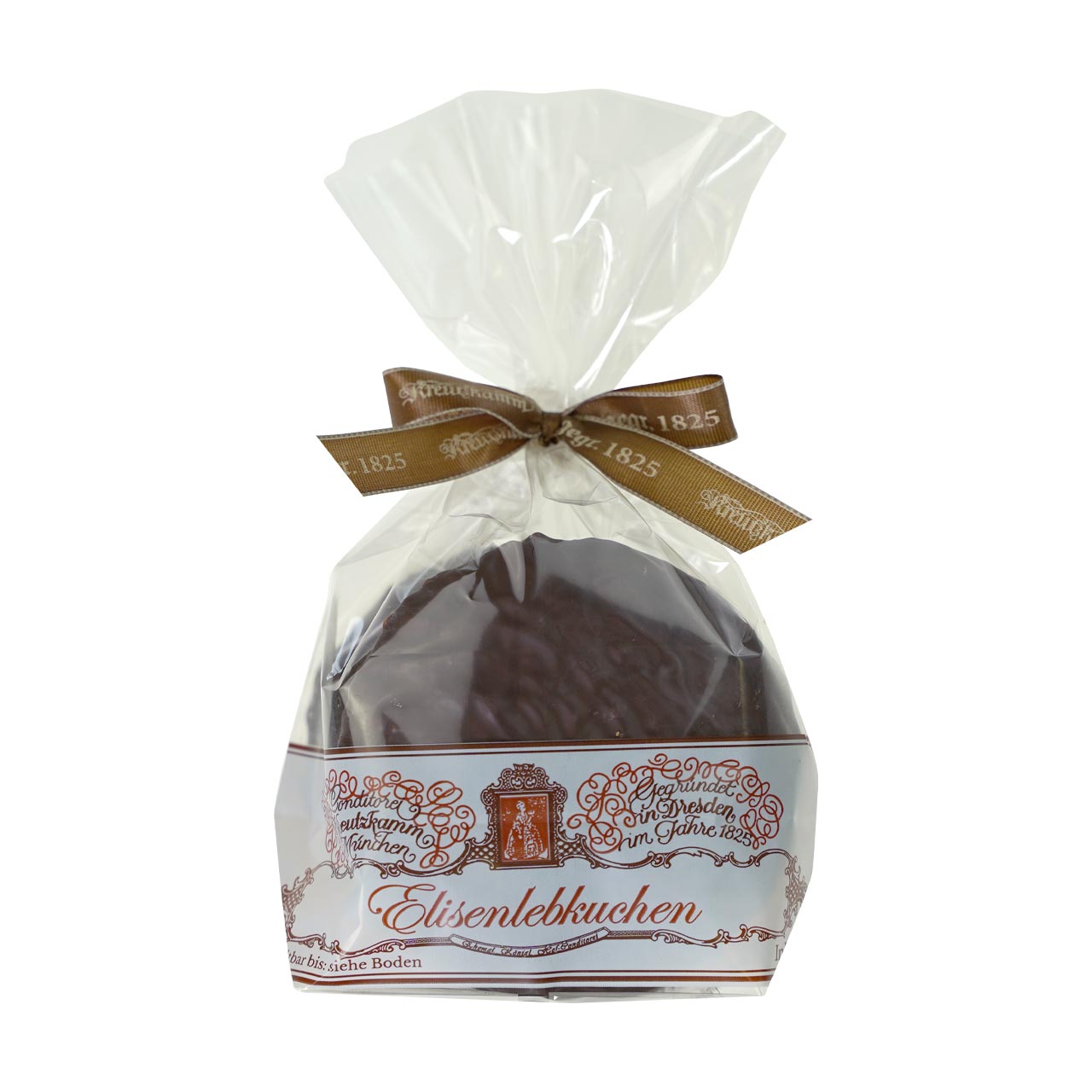 01-Lebkuchen-4er-schokoliert Ein Schokoladenlebkuchen, verpackt in Plastik, mit einer Schleife und der Aufschrift "Elisenlebkuchen" sowie "Backhaus Kreutzkamm, gegrundet in Dresden im Jahre 1825".