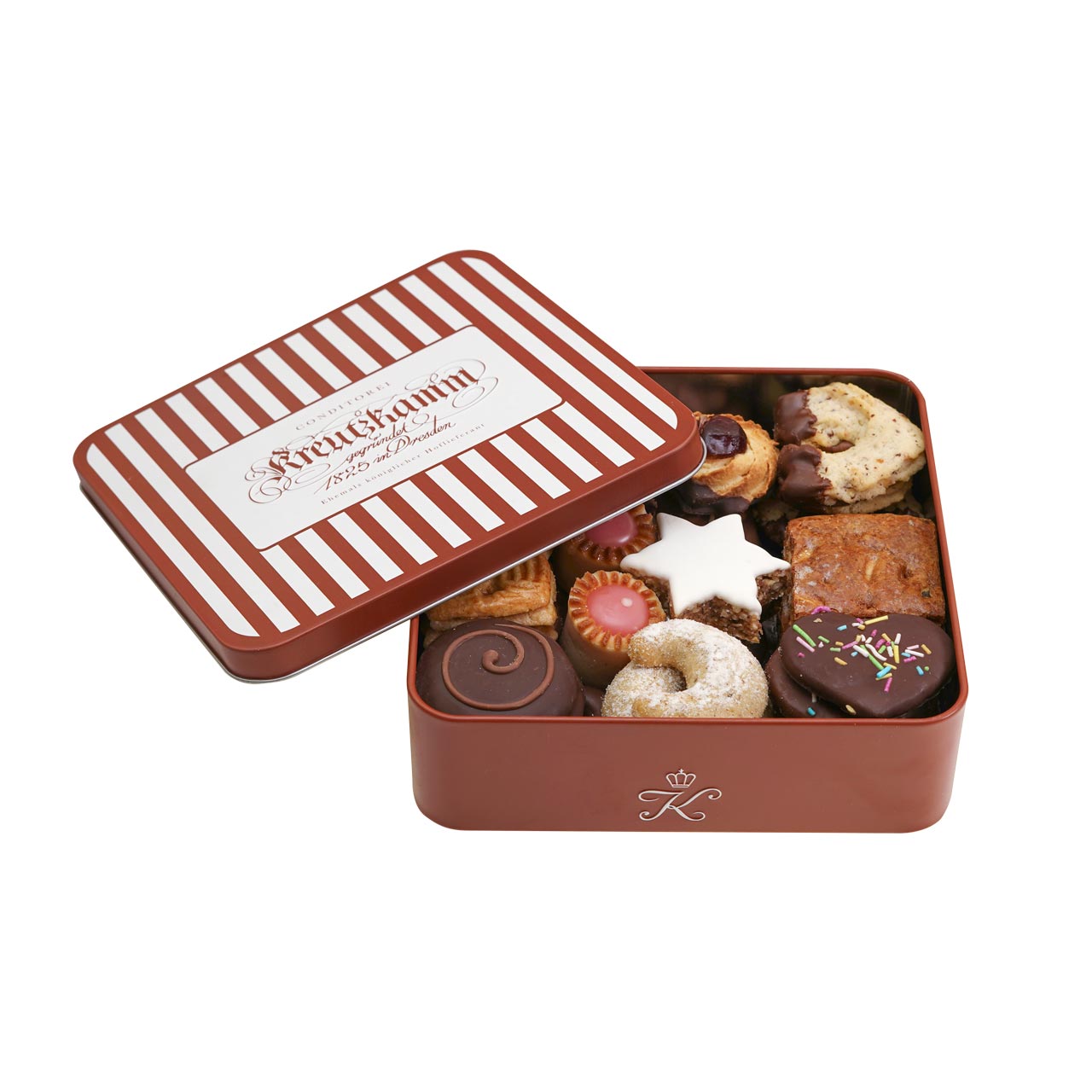 Weihnachtsgebaeck-in-der-Dose-4 Dose enthalt verschiedene Pralinen und Gebaeck; Deckel mit Streifen und 'Kreutzkamm'-Schriftzug.