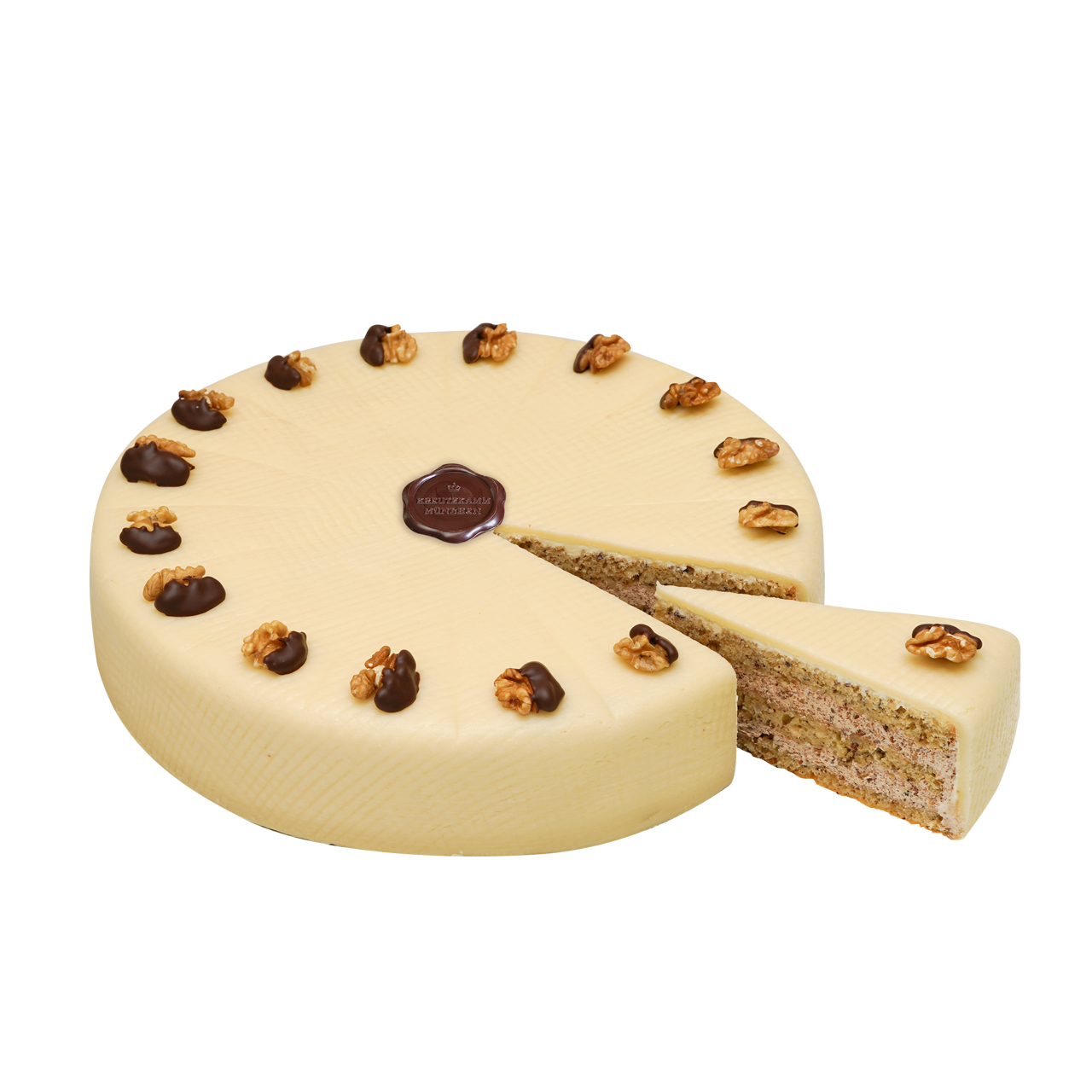 Walnuss-Torte-gross-Schnitt-St-ck Eine Sahnetorte mit Walnussdeko; ein Stueck herausgeschnitten; Aufschrift "Backhaus Kreutzkamm".