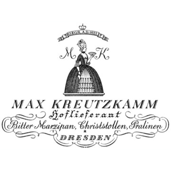 Frau in traditioneller Kleidung haelt Tablett. Text: Max Kreutzkamm, Hoflieferant, Bitter Marzipan, Christstollen, Pralinen, Dresden.