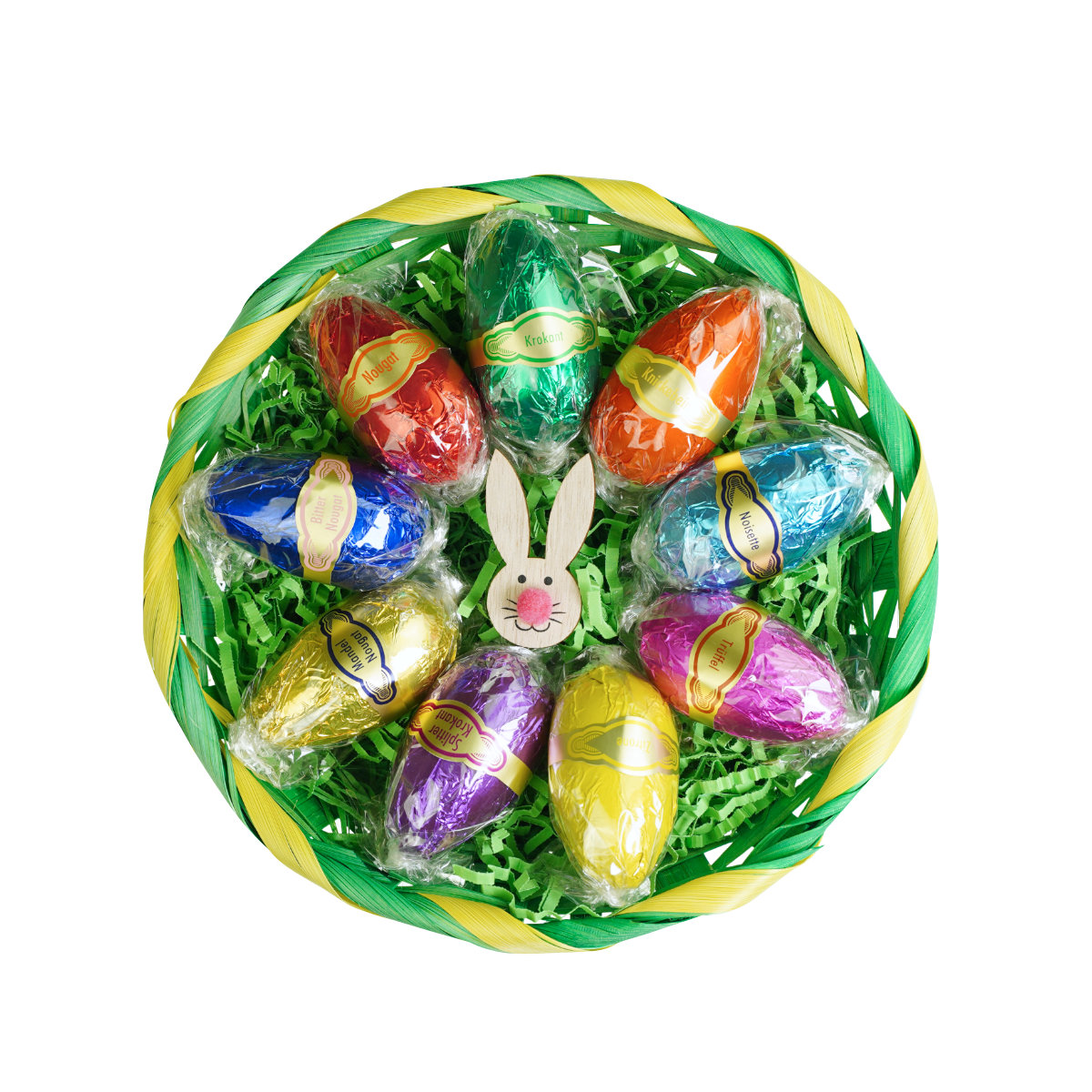 Desserteier-9-Stueck Bunter Korb mit 9 verpackten Schokoladeneiern und einer Hasenfigur auf gruenem Kunstgras.
