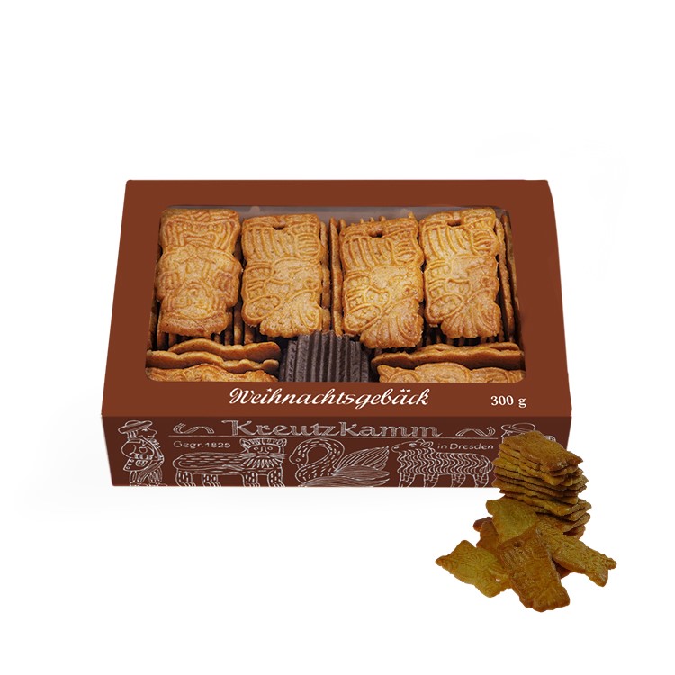 Butterspekulatius-Retro Kekse liegen in einer braunen Schachtel mit Sichtfenster. Text: Weihnachtengebaeck, Kreutzkamm, 300g, seit 1825 in Dresden
