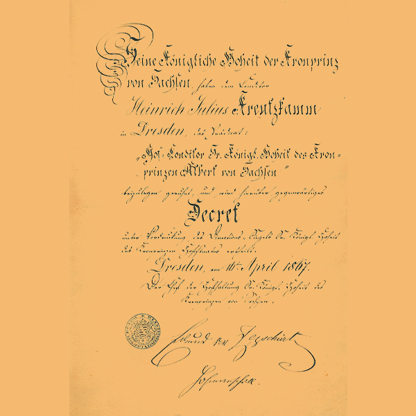 Dekorierte Urkunde mit folgendem Text: "Seine Koenigliche Hoheit der Kronprinz von Sachsen, Heinrich Julius Kreutzkamm, Dresden... Decret... Dresden, den 1. April 1867". Enth